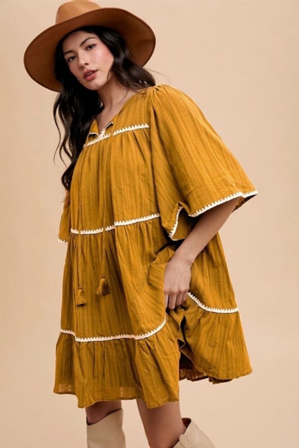 2ad2997f-643a-4b4c-bc85-dda15a51b697-Max Annie Wear Tassel Contrast Trim Tie Neck Half Sleeve Tiered Dress - Image 1