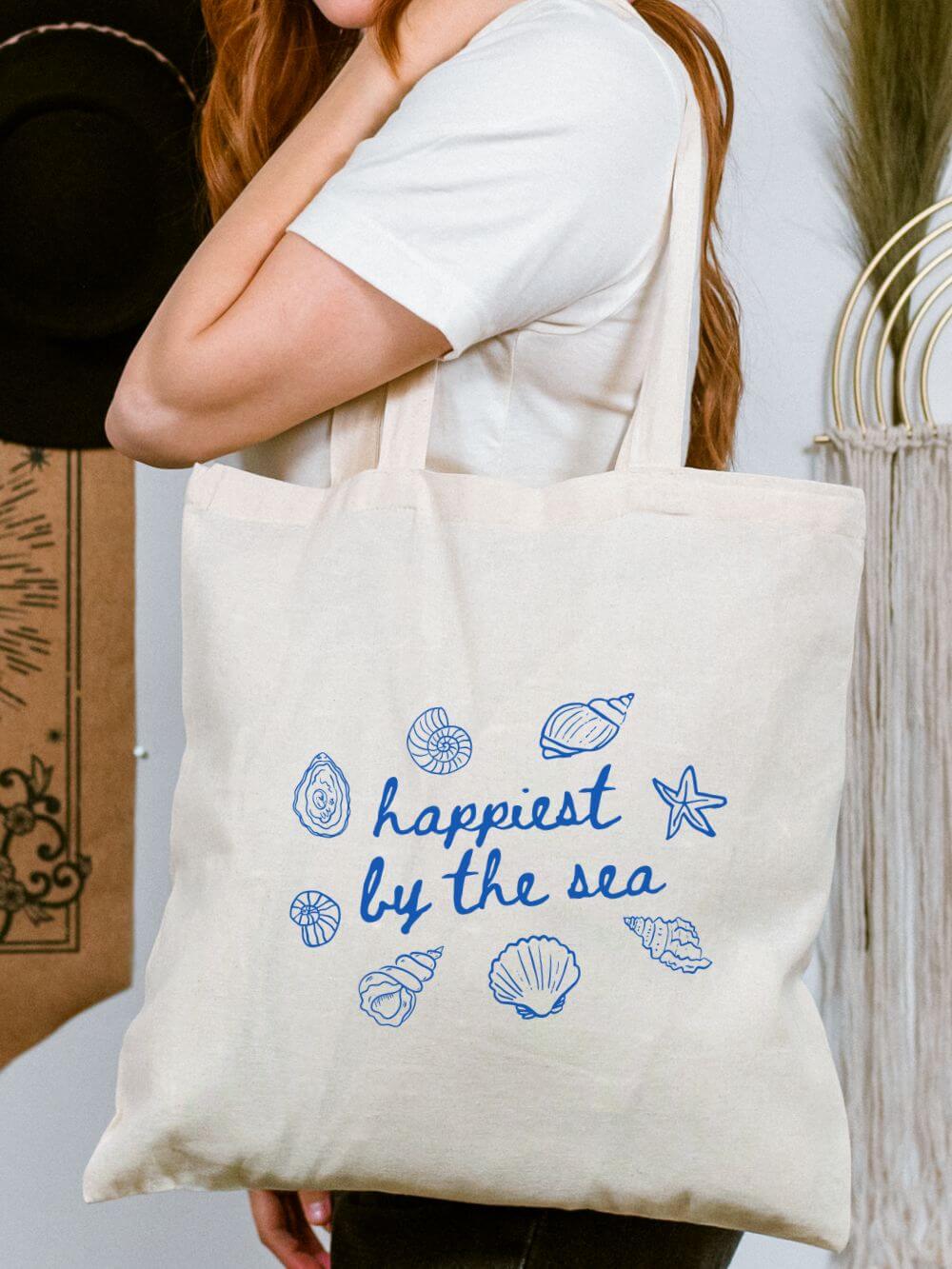 Happiest_By_the_Sea_Tote Happiest by the Sea Cotton Canvas Beach Tote Bag - Image 1