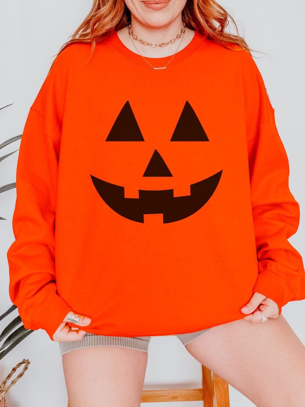Jack_O_Lantern_Sweatshirt_Orange Jack-O-Lantern Face Unisex Heavy Blend Crewneck Sweatshirt - Image 1